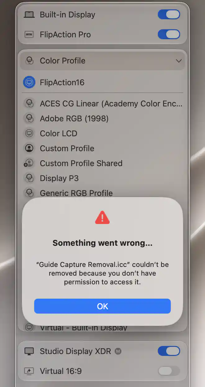 Something went wrong dialog reporting a color-profile removal permission error with an OK button
