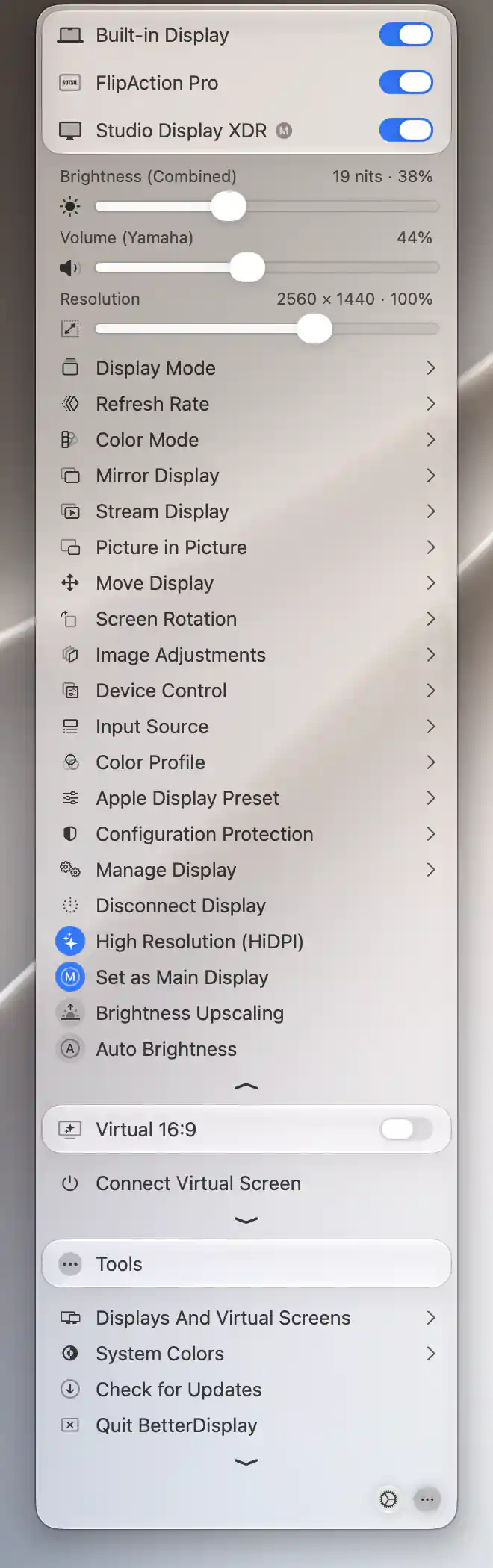 Studio Display XDR main-display header and Disconnect Display command, with a disconnected Virtual 16:9 header and Connect Virtual Screen command below