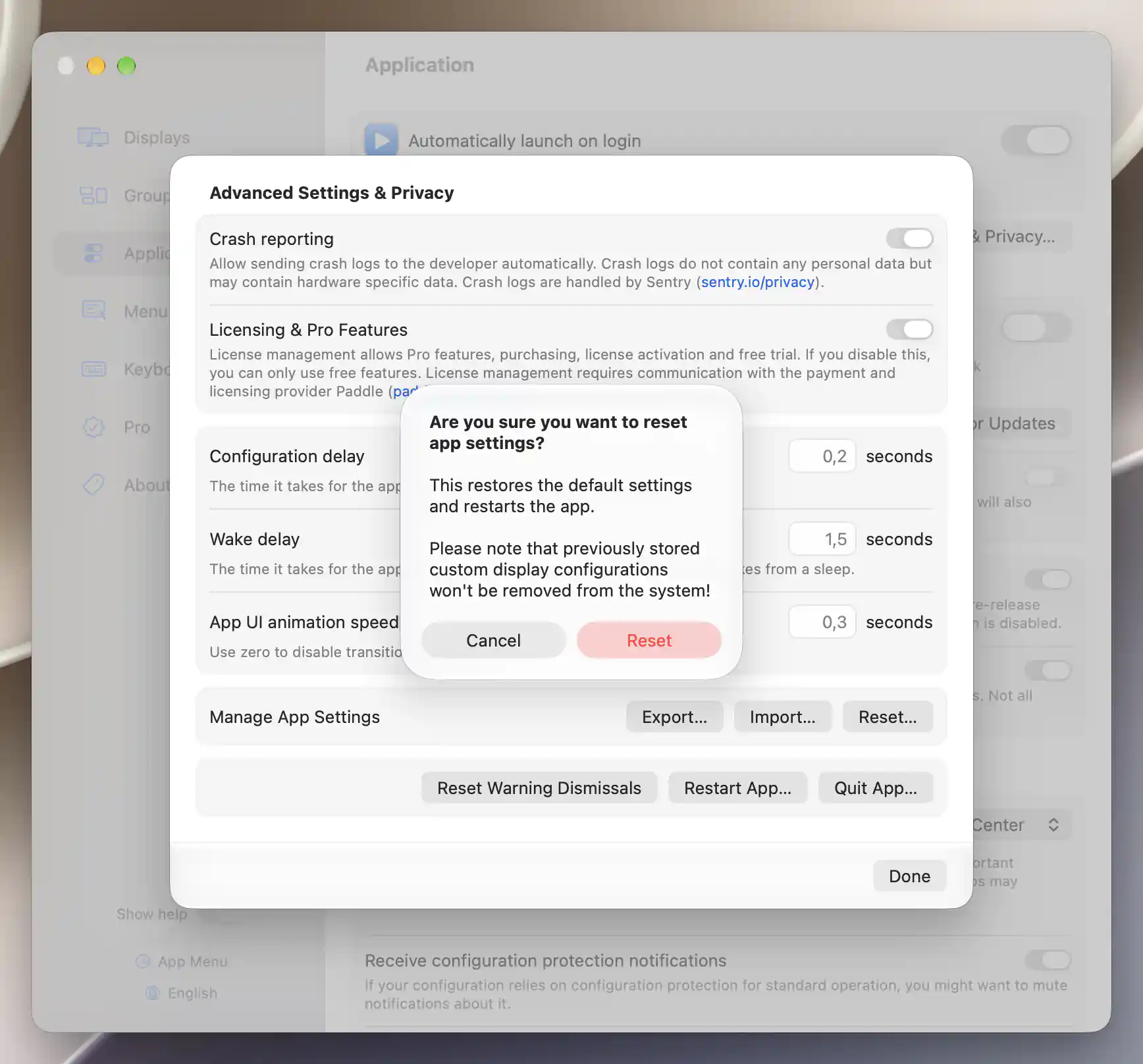 Reset requires confirmation and preserves custom display configurations stored in macOS
