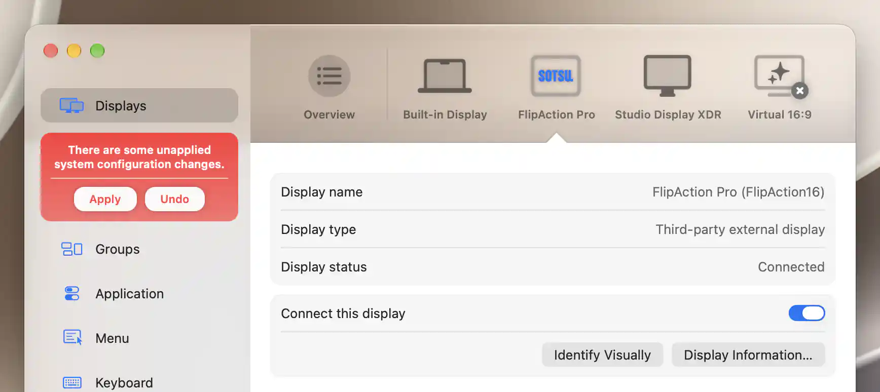 Pending system configuration notice with Apply and Undo beside the selected display