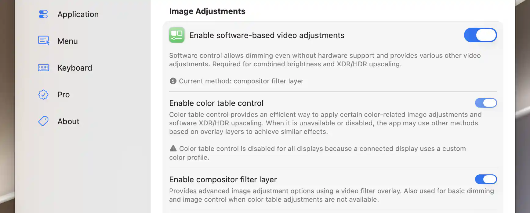 Image Adjustments warning that a connected display uses a custom color profile