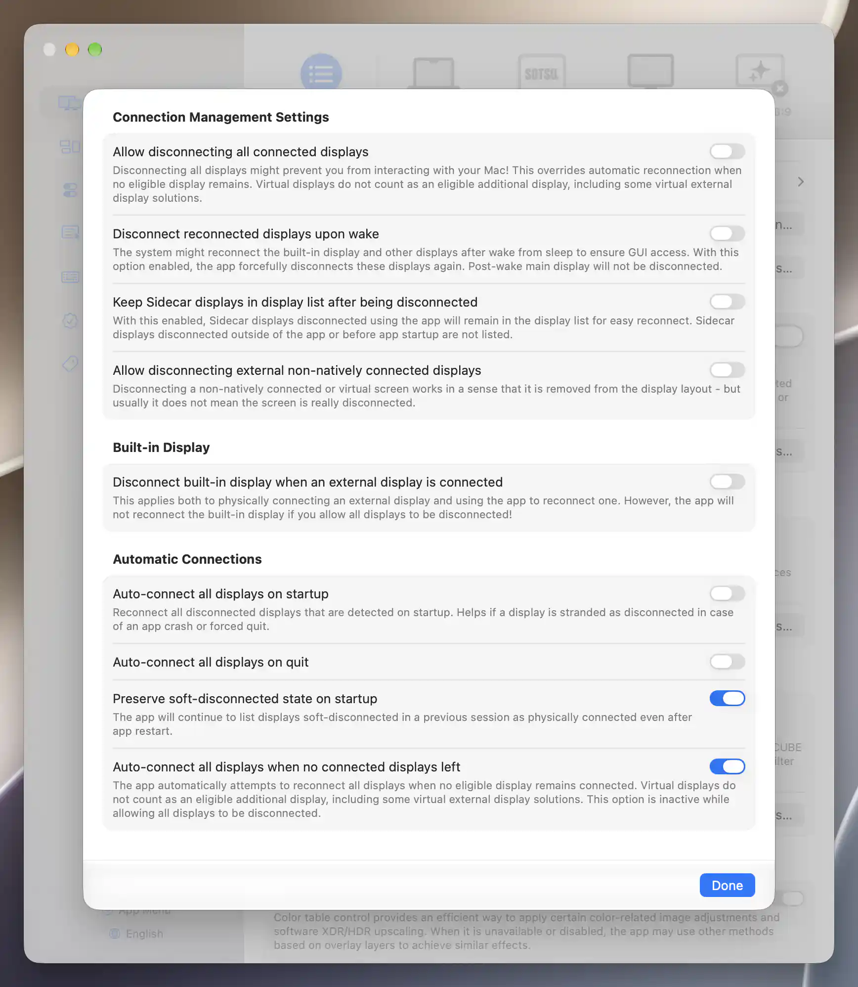 Connection Management Settings on Apple silicon showing safety, built-in display and automatic reconnection options