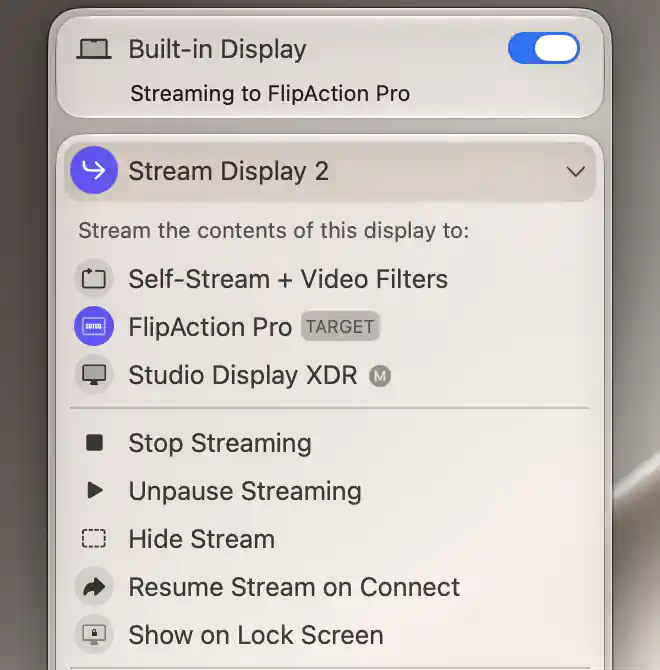Source display’s additional stream menu showing Unpause Streaming while the presentation remains visible on its selected audience display.