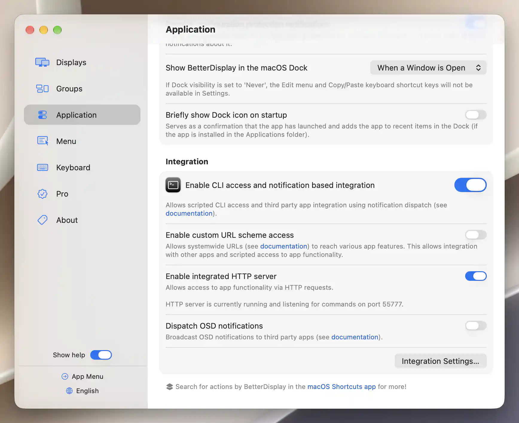 BetterDisplay Application Integration section with URL-scheme access off and the already-running HTTP server listening on port 55777; the private token settings sheet is closed.
