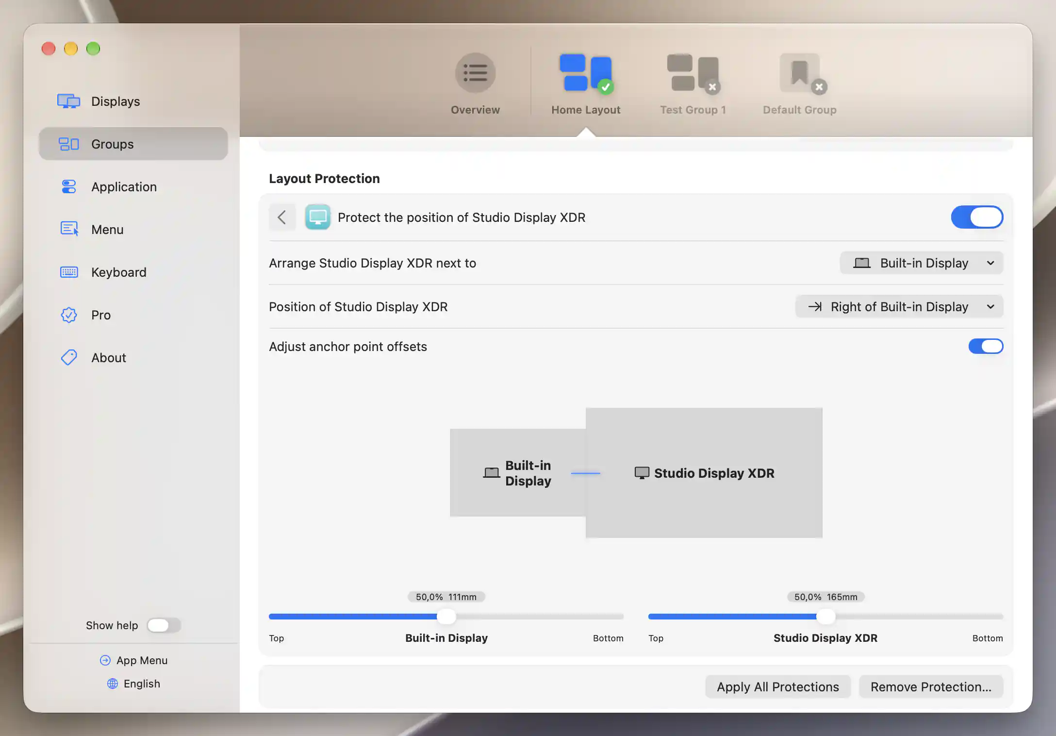 Home Layout active with only its two configured members, protecting Studio Display XDR to the right of Built-in Display.